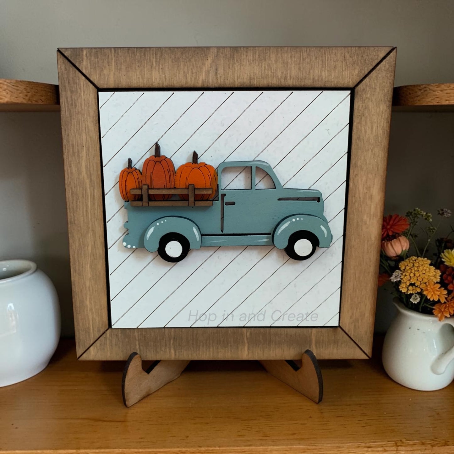 Blue truck with pumpkins