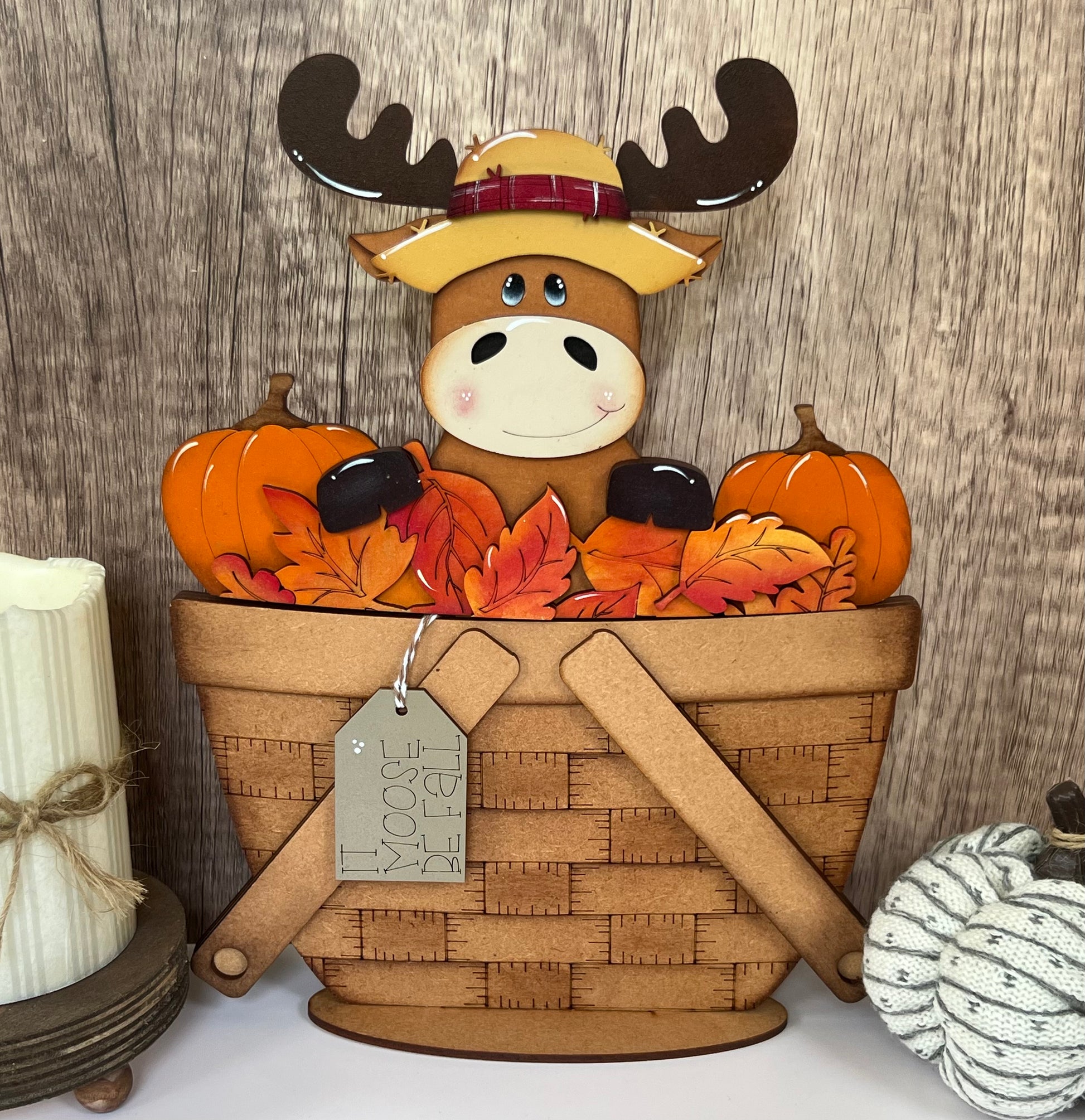 Fall moose surrounded by fall leaves 
