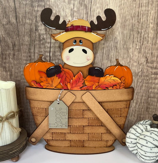 Fall moose surrounded by fall leaves 